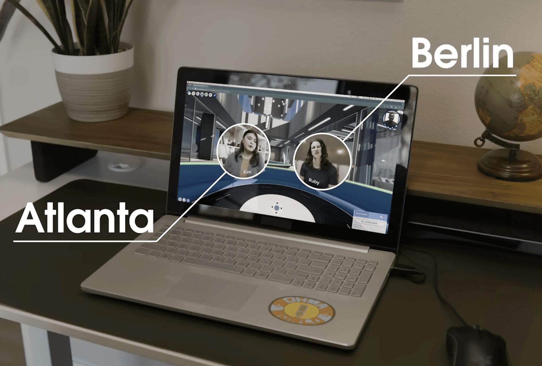 A laptop displaying coworkers in Katmai with Atlanta and Berlin callouts